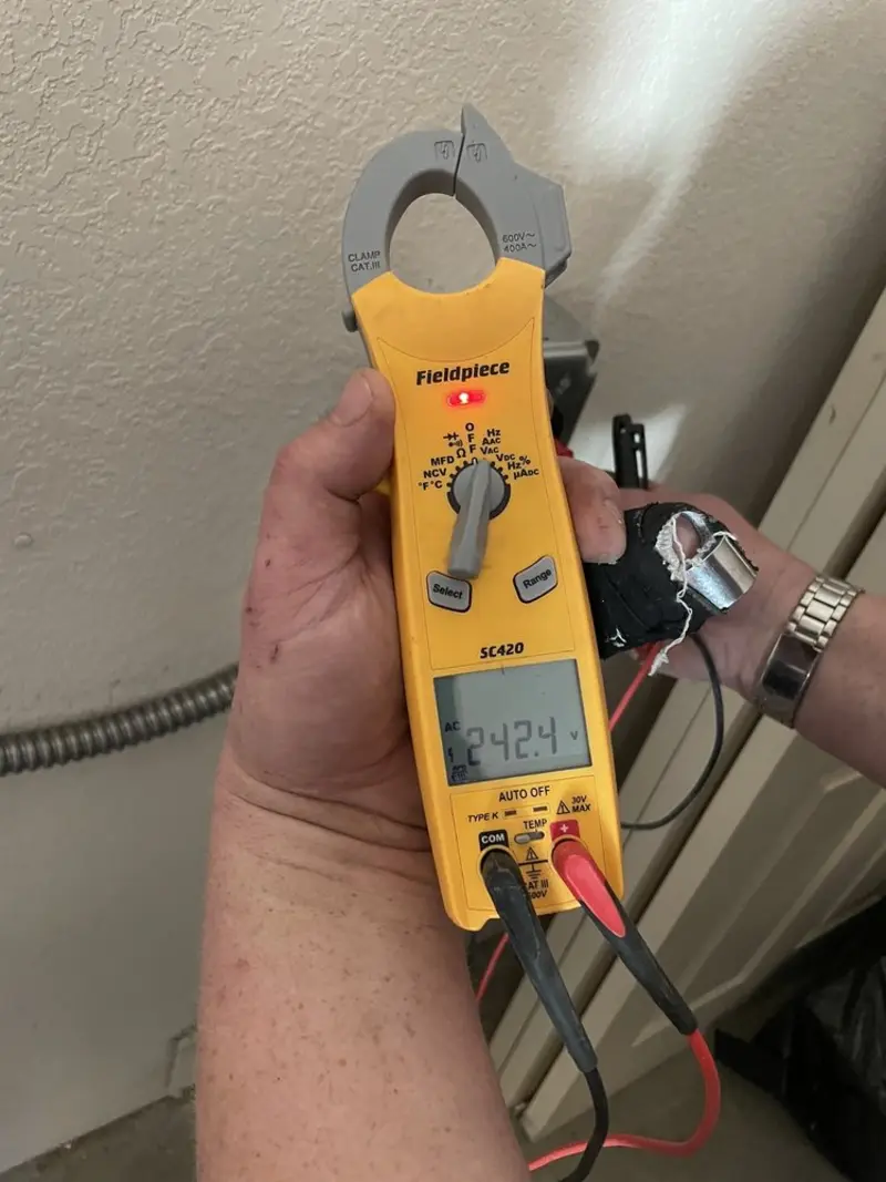 Voltage testing with clamp meter during Ceiling Fan Installation in Valley Center